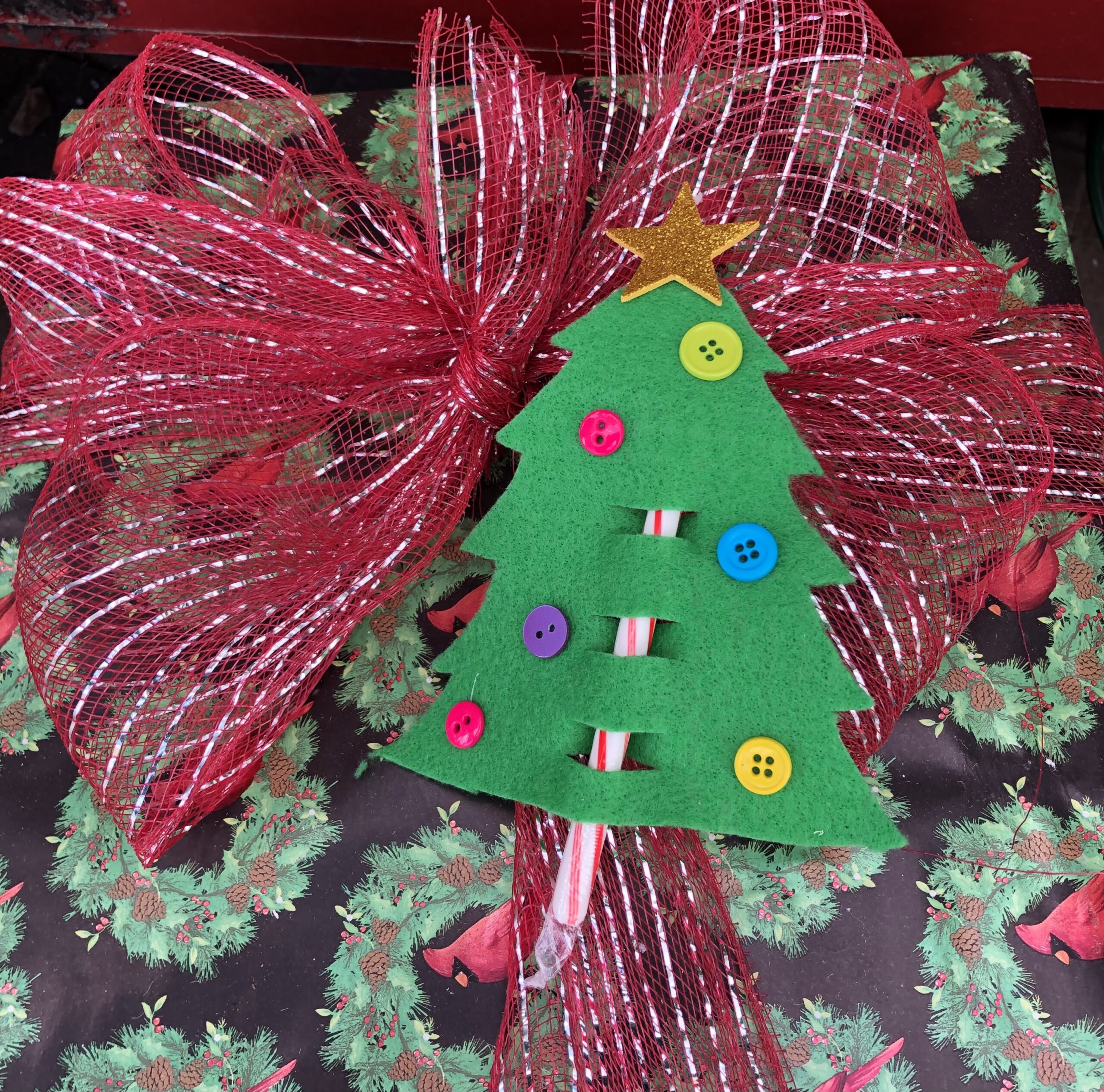 tree made of felt and candy cane